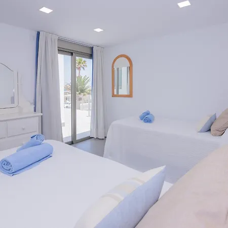 2 Beachfront By Holidays Apartment